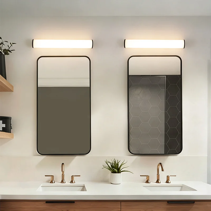 Wall mounted bathroom luminaire for hotel mirror and vanity lighting applications