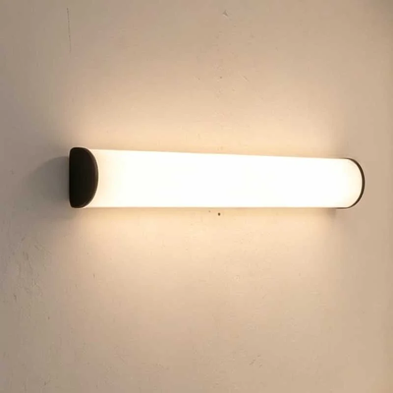Hotel bathroom lighting with vanity luminaire for mirror and wash area illumination